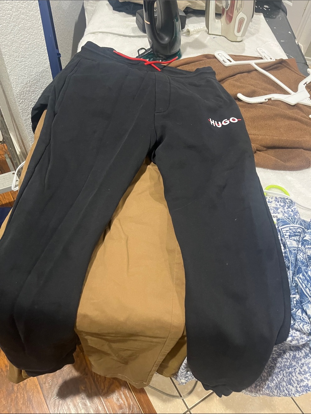 HUGO Black Sweatpants with Red Drawstring (Arm needs stitches)